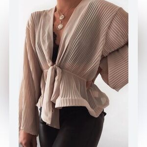 Nude Extreme Plunge Structured Peplum Pleated Top